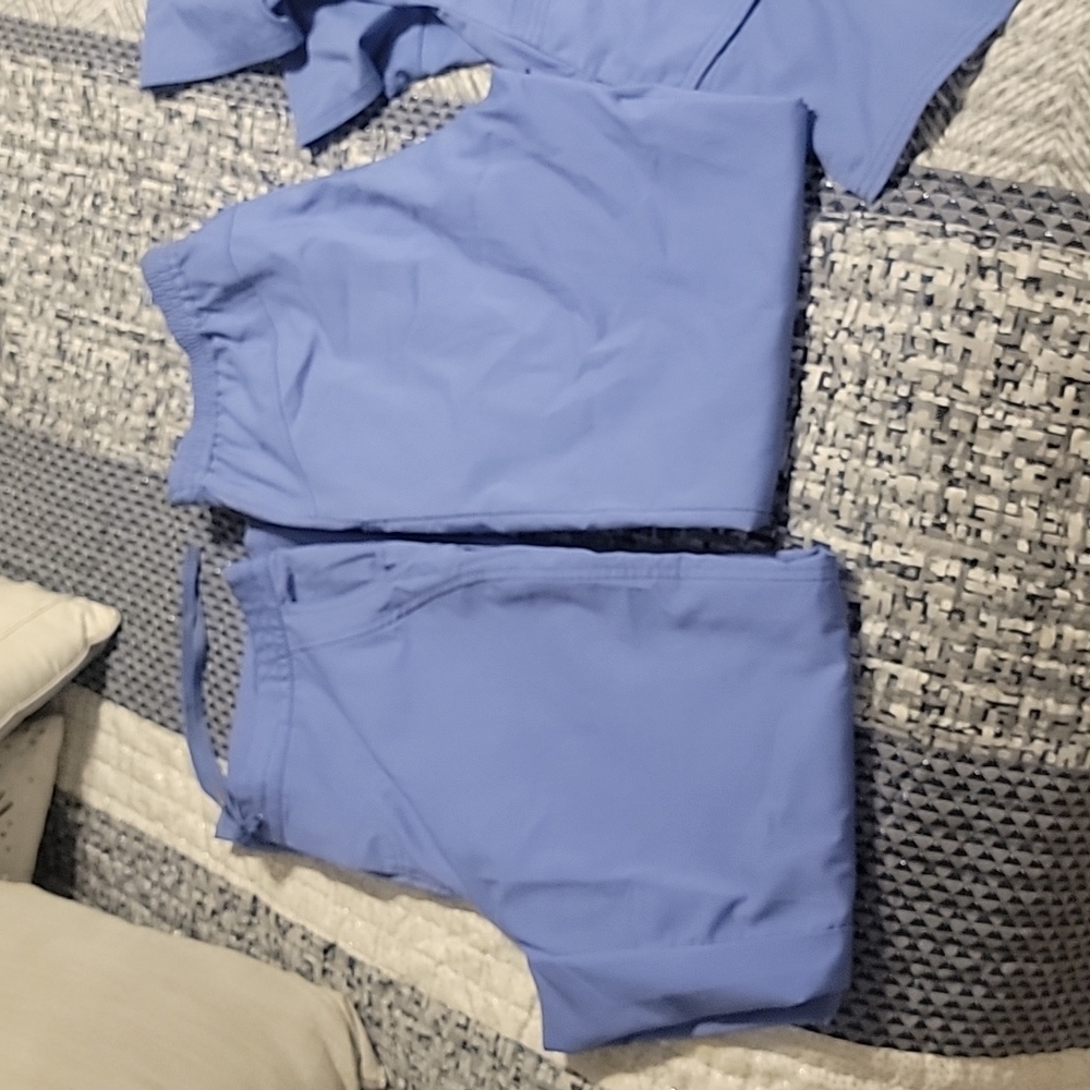 2 sets of healing hands scrubs